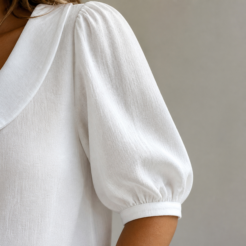 LuminaLuxe™ – Gentle Peter Pan Collar Half-Sleeve Top