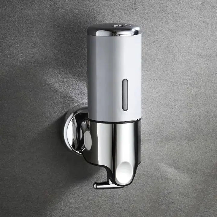 Soap dispenser for wall mounting