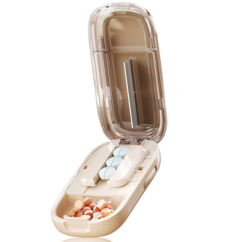 Portable pill organizer with cutter