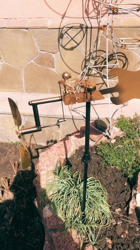 Metal windmill “Rock Band” – Moving garden decoration with character