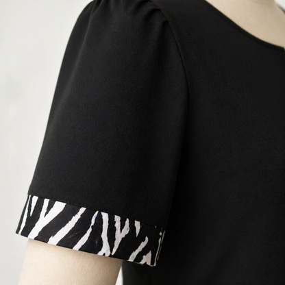 VeraNite™ – Striking Zebra Patchwork Maxi Dress Highlighted with Red Accents