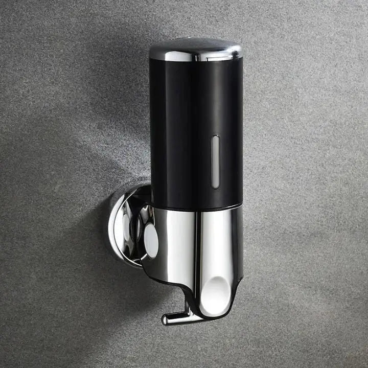 Soap dispenser for wall mounting