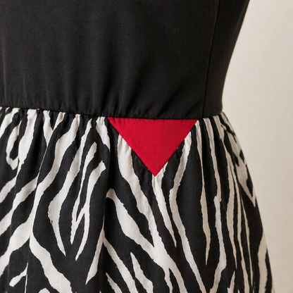 VeraNite™ – Striking Zebra Patchwork Maxi Dress Highlighted with Red Accents