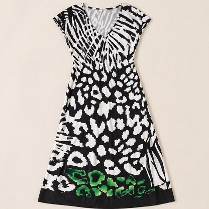 LuminaFlow™ – Flowy Midi Dress with V-Neck and Mixed Animal Print