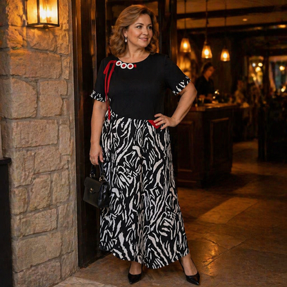 VeraNite™ – Striking Zebra Patchwork Maxi Dress Highlighted with Red Accents