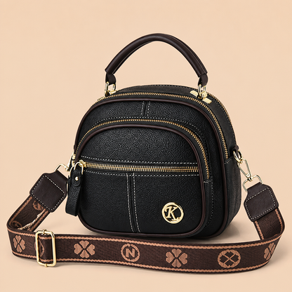 VieraBelle™ – Compact Structured Crossbody Bag with Bold Patterned Strap