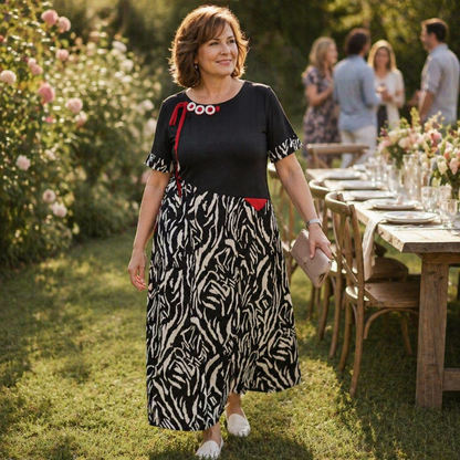 VeraNite™ – Striking Zebra Patchwork Maxi Dress Highlighted with Red Accents