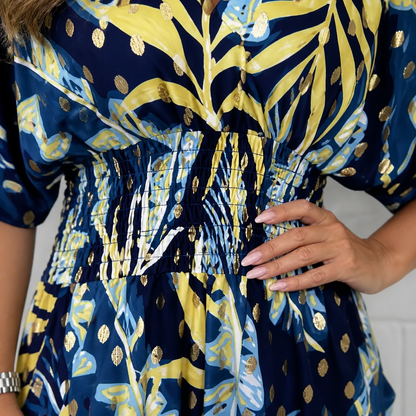 SerenaSculpt™ – Wide-Leg Jumpsuit with Tropical Print, V-Neck, and Smocked Waist